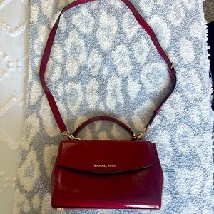 Michael Kor’s cross-body Handbag